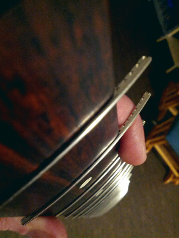 New frets in place. Fretboard is sanded and oiled.